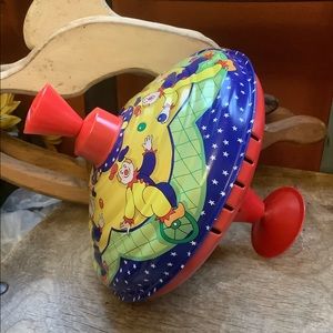 Clown Spinning Tin Top by Schylling